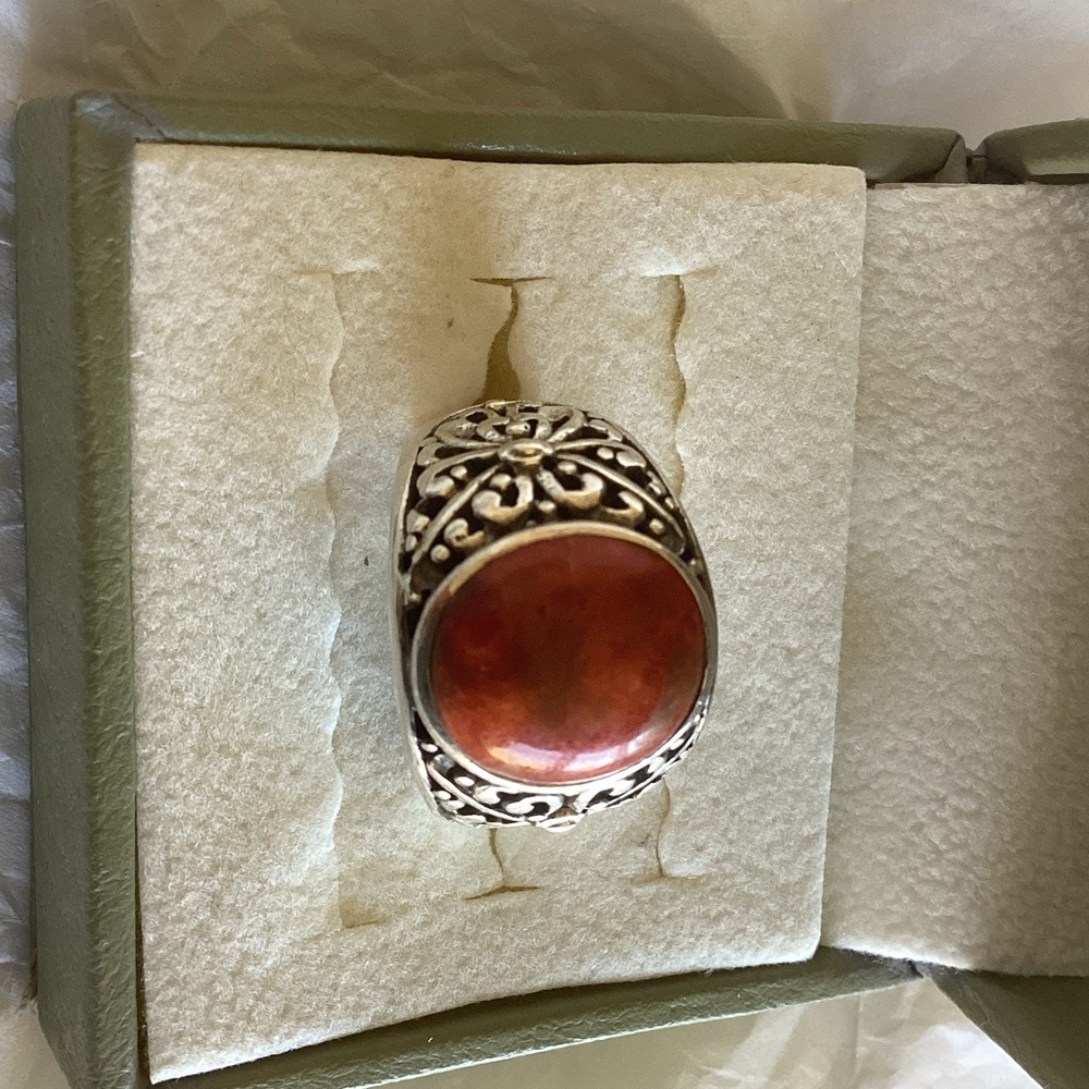 Elegant Silver Ring with Fiery Orange Stone